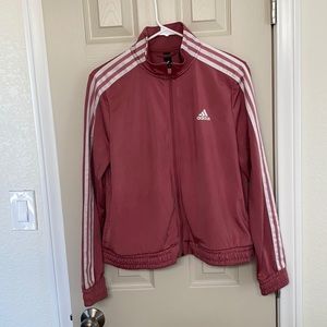 Pink athletic Adidas jacket with three stripes